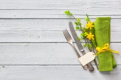 Spring table place setting with daffodils stock images Spring table place setting with daffodils stock images