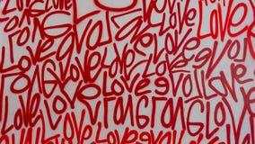 Sprutmålningsfärg för grafitti för förälskelsegatakonst arkivfoto Sprutmålningsfärg för grafitti för förälskelsegatakonst arkivfoto