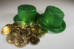 St. Patrick`s Day leprechaun hats, gold and bitcoins royalty free stock images St. Patrick`s Day leprechaun hats, gold and bitcoins royalty free stock images