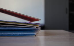 A stack of folders with documents on the table royalty free stock image A stack of folders with documents on the table royalty free stock image