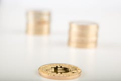 Stack of golden Bitcoins single of them laying on the gray surface.. stock image Stack of golden Bitcoins single of them laying on the gray surface.. stock image