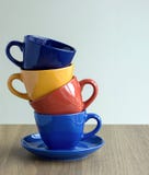 Stack Of Colorful Coffee Cups On Table Stock Photos Stack Of Colorful Coffee Cups On Table Stock Photos
