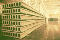 Stack of precast reinforced concrete slabs in factory workshop stock photos Stack of precast reinforced concrete slabs in factory workshop stock photos