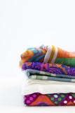 Stacked fabrics with vivd colors and patterns. stock photos Stacked fabrics with vivd colors and patterns. stock photos