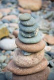 Stacked stones on a colorful rocky beach royalty free stock photos Stacked stones on a colorful rocky beach royalty free stock photos
