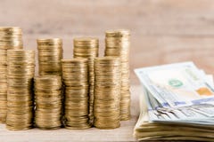 Stacks of coins and dollar bills royalty free stock photography Stacks of coins and dollar bills royalty free stock photography