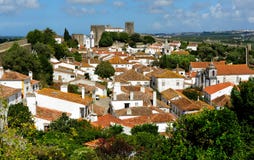 Stad inom slottväggar, Obidos, Portugal Fotografering för Bildbyråer Stad inom slottväggar, Obidos, Portugal Fotografering för Bildbyråer