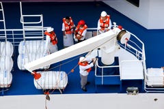 Staff team with lifejackets on rescue training stock image Staff team with lifejackets on rescue training stock image