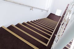 A staircase in the white passage royalty free stock photo A staircase in the white passage royalty free stock photo