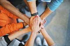 Stapel Hände ein Symbol der Teamwork