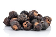 Stapel van geïsoleerde soapnuts stock foto Stapel van geïsoleerde soapnuts stock foto