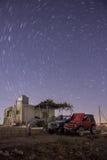 Star trails cabin farmhouse stock photo Star trails cabin farmhouse stock photo