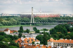 Stara architektura, most, Vistula rzeka, Krajowy stadium w Warszawa obraz royalty free Stara architektura, most, Vistula rzeka, Krajowy stadium w Warszawa obraz royalty free