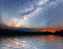Starry Sky Over The Sea. Fantastic Milky Way. Meteor Shower Royalty Free Stock Photography Starry Sky Over The Sea. Fantastic Milky Way. Meteor Shower Royalty Free Stock Photography