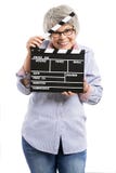 Starsza kobieta trzyma clapboard zdjęcie stock Starsza kobieta trzyma clapboard zdjęcie stock