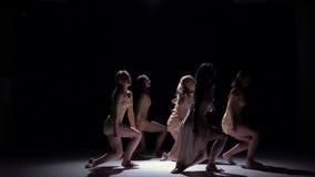 Start contemporary dance of five dancers in white clothes on black, shadow, slow motion stock video footage Start contemporary dance of five dancers in white clothes on black, shadow, slow motion stock video footage