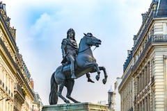 Statue of King Louis XIV in Victory Square in Paris stock photo Statue of King Louis XIV in Victory Square in Paris stock photo