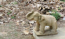 Statue of an old elephant in a park stock images Statue of an old elephant in a park stock images