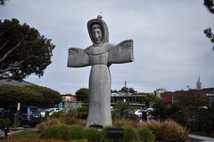 Statue of Saint Francis of Assisi top by a real live seagull, 2. stock photography Statue of Saint Francis of Assisi top by a real live seagull, 2. stock photography