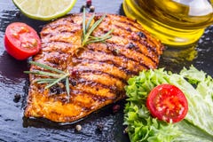 Steak chicken breast olive oil cherry tomatoes pepper and rosemary herbs. Royalty Free Stock Photo Steak chicken breast olive oil cherry tomatoes pepper and rosemary herbs. Royalty Free Stock Photo