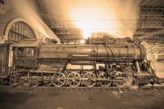 Steam Train Arrives To The Station At Night Time. Royalty Free Stock Photos Steam Train Arrives To The Station At Night Time. Royalty Free Stock Photos