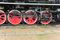 Steam train wheels in red color stock photography Steam train wheels in red color stock photography