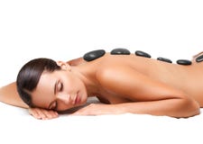 Steenmassage. Beautiful Woman Getting Spa Hete Stenenmassage. S royalty-vrije stock afbeelding Steenmassage. Beautiful Woman Getting Spa Hete Stenenmassage. S royalty-vrije stock afbeelding