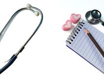 Stethoscope and notebook record, white background royalty free stock photo Stethoscope and notebook record, white background royalty free stock photo