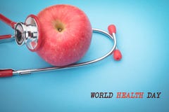 Stetoscopio di sanità e della medicina di giorno di salute di mondo e mela rossa sani e concetto di assicurazione Immagine Stock Stetoscopio di sanità e della medicina di giorno di salute di mondo e mela rossa sani e concetto di assicurazione Immagine Stock