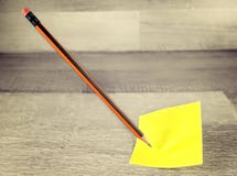 Sticky notes and pencil questions or decision making concept stock images Sticky notes and pencil questions or decision making concept stock images