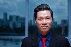 Stilig asiatisk affärsman arkivfoto Stilig asiatisk affärsman arkivfoto