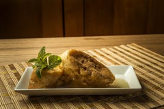 French toast in a rectangular dish on a bamboo mat Stock Image French toast in a rectangular dish on a bamboo mat Stock Image