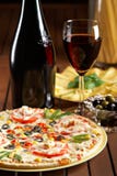 Still Life With Red Wine And Pizza Royalty Free Stock Photos