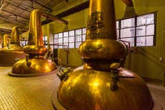 Stillheter för whiskyspritfabrikkoppar arkivfoto Stillheter för whiskyspritfabrikkoppar arkivfoto