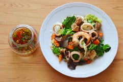 Stir fried mixed vegetable with seafood and chili fish sauce royalty free stock photos Stir fried mixed vegetable with seafood and chili fish sauce royalty free stock photos
