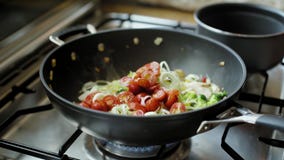 Stir fry of fresh vegetables in wok pan