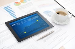 Stock market analytics on apple ipad stock image Stock market analytics on apple ipad stock image