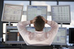 Stock Trader Watching Computer Screens With Hands On Head Royalty Free Stock Photo Stock Trader Watching Computer Screens With Hands On Head Royalty Free Stock Photo