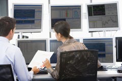 Stock Traders Viewing Monitors Stock Photos Stock Traders Viewing Monitors Stock Photos