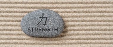 Stone with the inscription Strength stock photo Stone with the inscription Strength stock photo