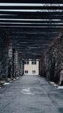 A stonetunel with a gloomy ambience stock photo A stonetunel with a gloomy ambience stock photo