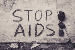 Stop Aids text hand write by black chacoal stock images Stop Aids text hand write by black chacoal stock images