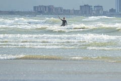 Kite surfing in stormy sea of netherlands royalty free stock photography Kite surfing in stormy sea of netherlands royalty free stock photography