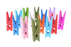Stos coloured drewniany odziewa klamerki odizolowywać zdjęcia stock Stos coloured drewniany odziewa klamerki odizolowywać zdjęcia stock