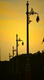 Straatlantaarn bij zonsondergang stock afbeelding Straatlantaarn bij zonsondergang stock afbeelding