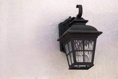 Straatlantaarn dichte omhooggaand op geweven muur stock foto Straatlantaarn dichte omhooggaand op geweven muur stock foto