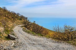 Strada della montagna della sporcizia di bobina fotografia stock libera da diritti Strada della montagna della sporcizia di bobina fotografia stock libera da diritti