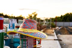 Straw hat was forgotten and left after I finished, work. Stock Photography Straw hat was forgotten and left after I finished, work. Stock Photography
