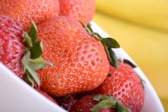 strawberries and bananas close up, health food Royalty Free Stock Photography strawberries and bananas close up, health food Royalty Free Stock Photography