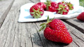Strawberries on Top of Brown Table Royalty Free Stock Image Strawberries on Top of Brown Table Royalty Free Stock Image